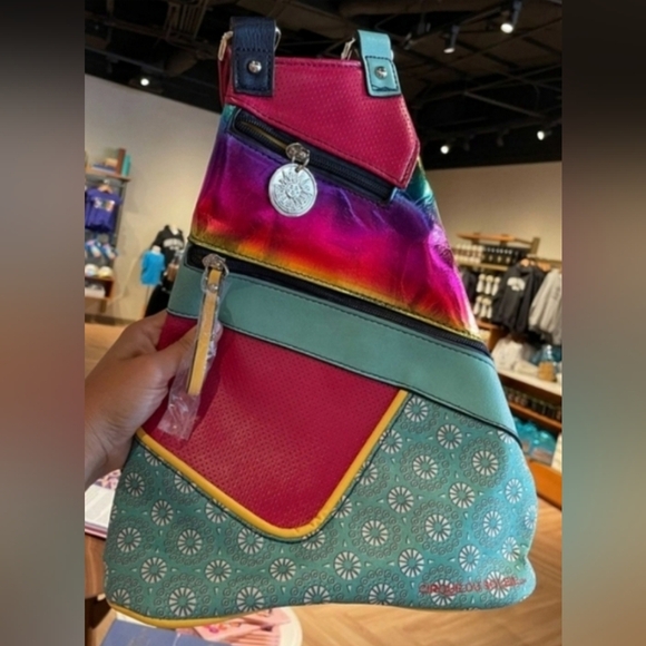 Cirque du Soleil Leather/Cloth Triangular Sling Bag Converts to Backpack - Picture 1 of 8